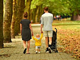 parents walking with child- adoption story