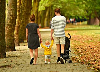 parents walking with child- adoption story