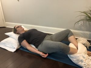Reclined supported bound angle pose