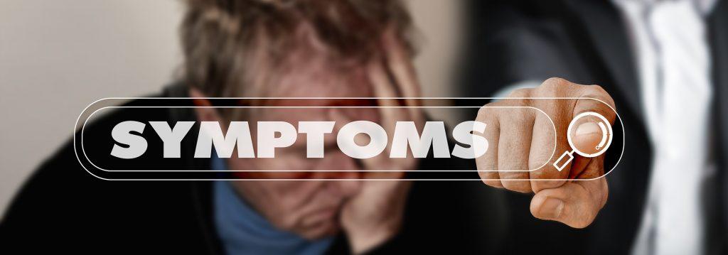 photo of man pointing finger with the word symptoms across 