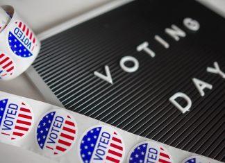 voting day sign with stickers