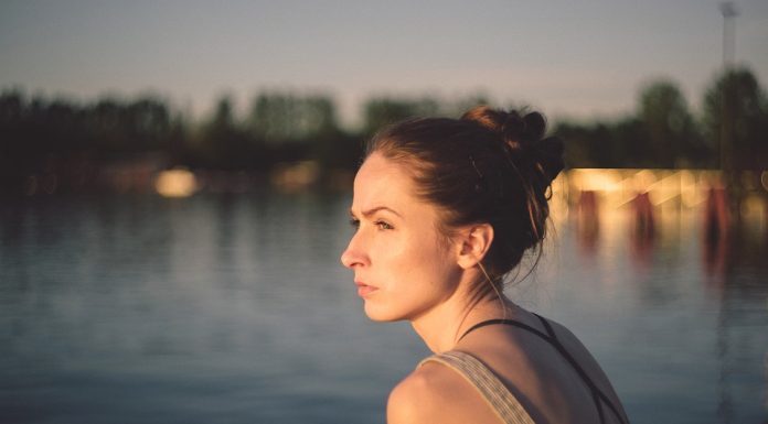 woman by a lake